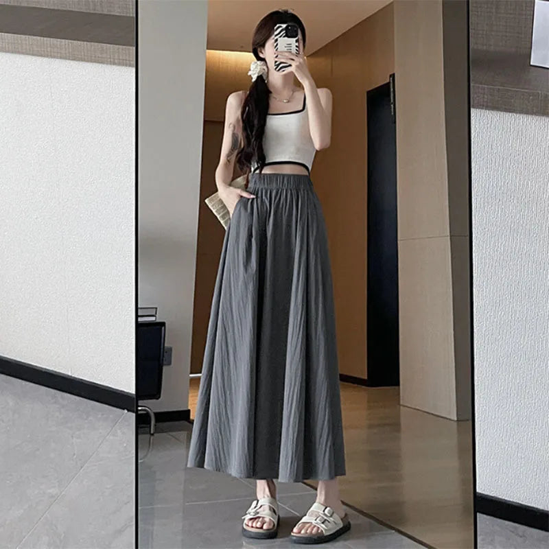 Long Skirt for Women 2026 Summer Casual Elastic High Waist A-line Skirts Female Solid Color Versatile Loose Pockets Midi Skirts
